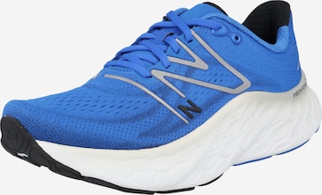 new balance حذاء للركض بلون أزرق: الأمام