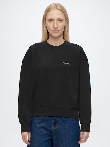Calvin KleinSweater majica - crna boja: prednji dio