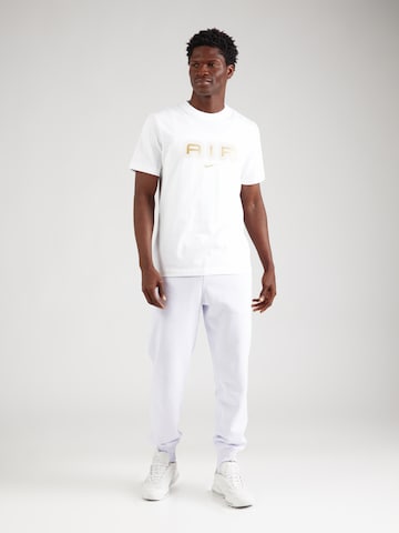Nike Sportswear - Tapered Pantalón 'CLUB' en lila