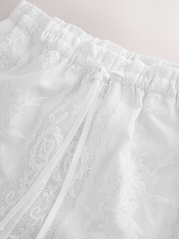 balta Next Plačios klešnės Kelnės