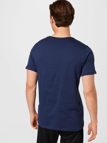 T-Shirt fonctionnel Hummel en bleu