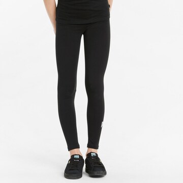 PUMA - Skinny Leggings 'ESS+' en negro: frente