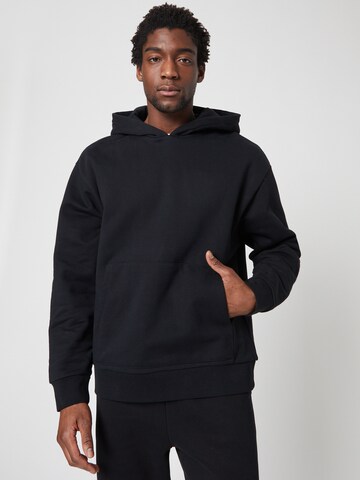 ABOUT YOU x Louis Darcis Sweatshirt in Black: front