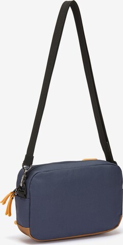 Sac à bandoulière Pacsafe en bleu