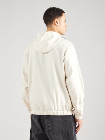 ELLESSE Between-Season Jacket 'Mont OH' in Beige