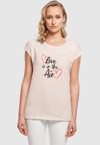 Merchcode T-Shirt 'Valentines Day - Love is in the Air' in Pink: predná strana