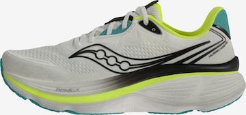 Chaussure de course saucony en blanc : devant
