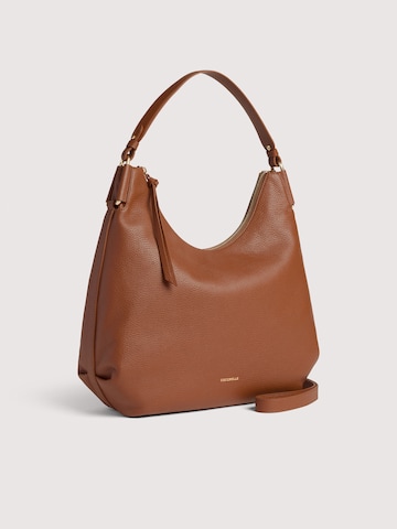 Coccinelle Handtas 'COCCINELLE REBEKKA 4' in Bruin