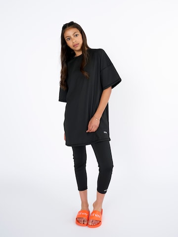Abbigliamento da mare sportivo ''Chay Sea Active Black Kids Burkini Swimset sport'' di Chay in nero: frontale