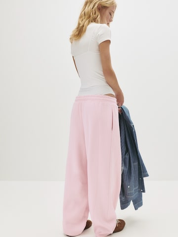 Pull&Bear Široke hlačnice Hlače | roza barva