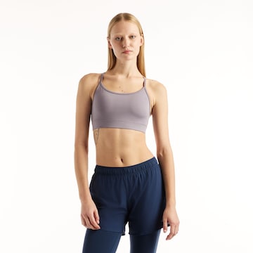 new balance Sport bh 'Essential Yoga Bra' in Grijs: voorkant