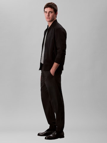 Calvin Klein regular Bukser 'TECH' i sort