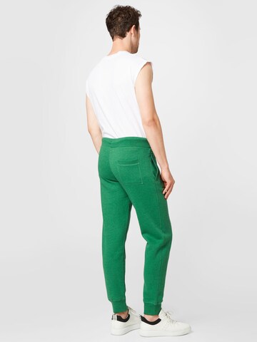 Superdry Zúžený Kalhoty – zelená