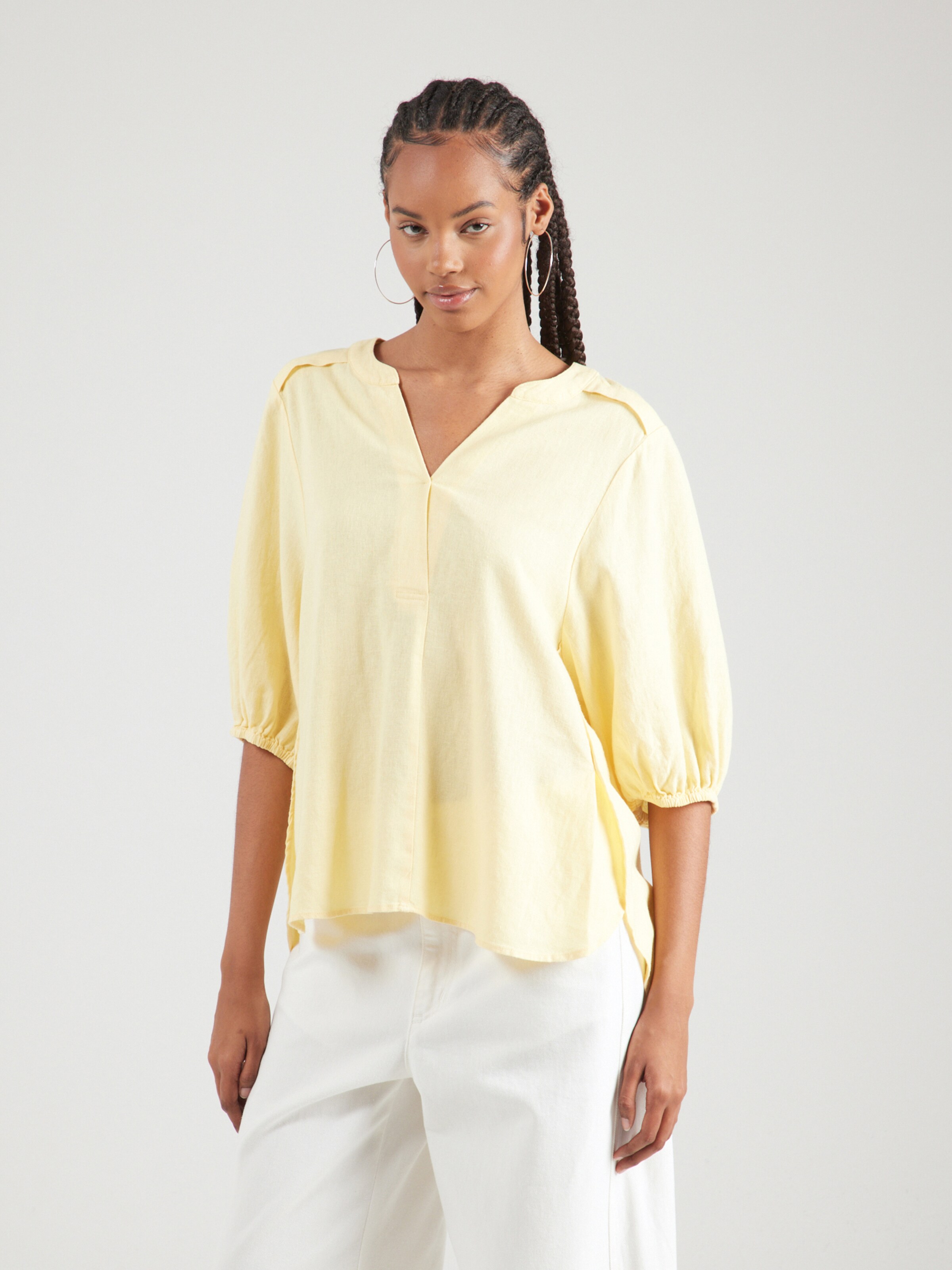pastel yellow blouse