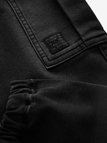 Next - Tapered Vaquero en negro