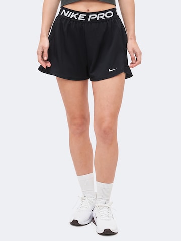 NIKE Loosefit Sporthose 'NP' in Schwarz: Vorderseite