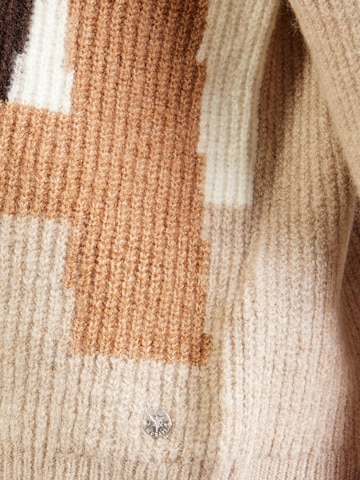 Pullover di monari in beige