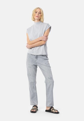 Regular Jean 'Lani' Elias Rumelis en bleu