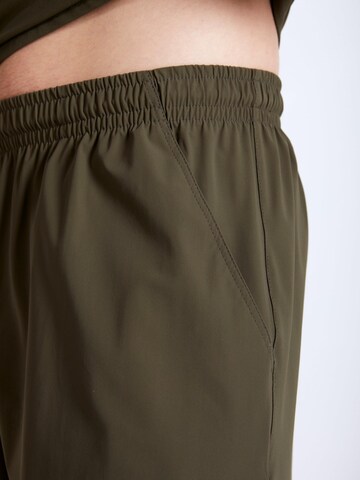 Regular Pantalon de sport 'Shorts' SPORTKIND en vert