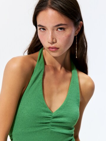 Pull&Bear Stickad klänning i grön