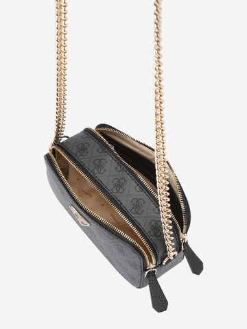 Guess chain sling bag sales