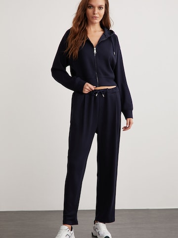 Veste de survêtement Grimelange en bleu