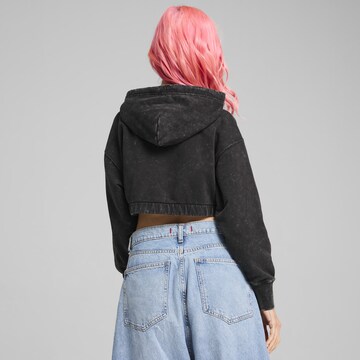 PUMA Sweatshirt 'DARE TO ' in Schwarz