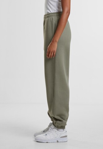 Urban Classics Конический (Tapered) Штаны в Зеленый