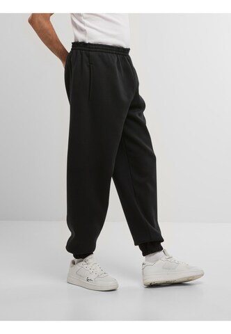 Loosefit Pantalon de sport ' ' Karl Kani en noir