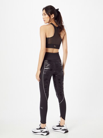 PUMA Skinny Sportbroek in Zwart