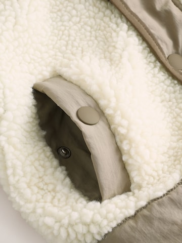 Next Tussenjas in Beige