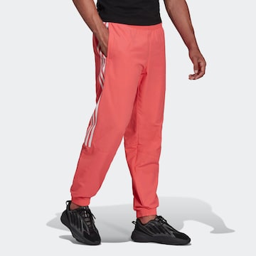 Tapered Pantaloni 'Adicolor Classics Trefoil' di ADIDAS ORIGINALS in rosso