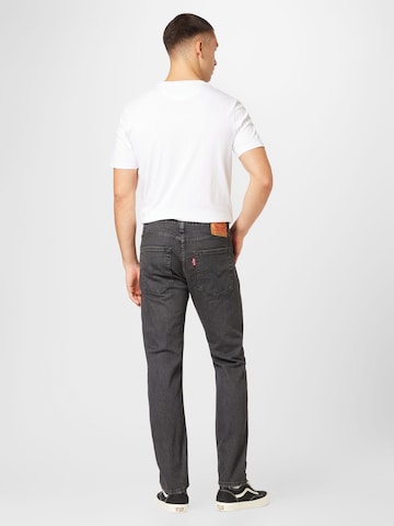 LEVI'S ® Tapered Jeans '502™ Taper Hi Ball' in Zwart