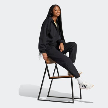 ADIDAS SPORTSWEAR Конический (Tapered) Спортивные штаны 'FI' в Черный
