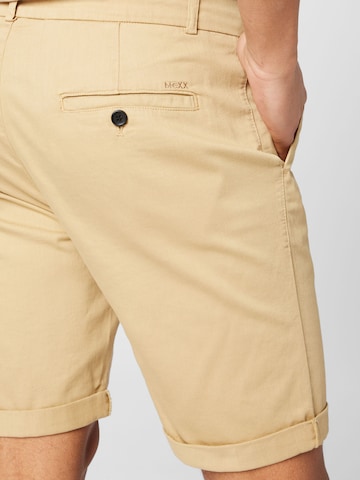 MEXX - regular Pantalón plisado en beige