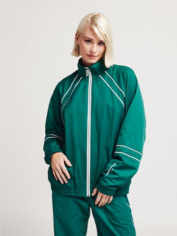 UNFOLLOWED x ABOUT YOU Sports jacket 'ESCAPE JACKET' in Green: front