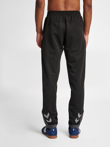 Hummel Slim fit Workout Pants 'Lead Poly' in Black