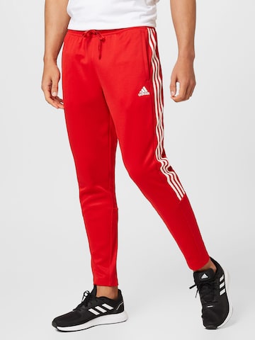 ADIDAS SPORTSWEAR Slim fit Workout Pants 'Tiro Suit-Up Lifestyle' in Red: front