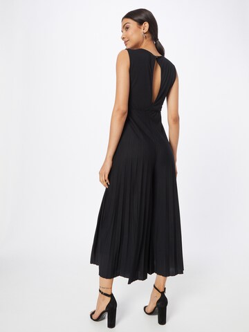 Tuta jumpsuit 'Dotta' di ABOUT YOU in nero