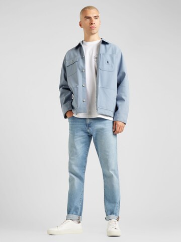 Carhartt WIP Kurtka przejściowa 'Michigan' w kolorze niebieski
