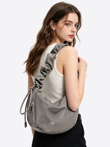 Magicshe Schultertasche‌ in Grau