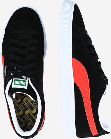 Baskets basses 'Classic XXI' PUMA en noir