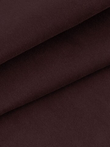 Next Slimfit Chinohousut värissä punainen