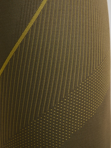 zaļš UNDER ARMOUR Šaurs Sporta bikses 'Vanish'