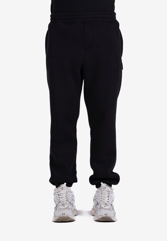 Prohibited Loose fit Pants in Black: front