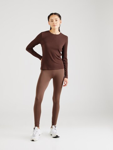 Athlecia Performance shirt 'Lankae' in Brown