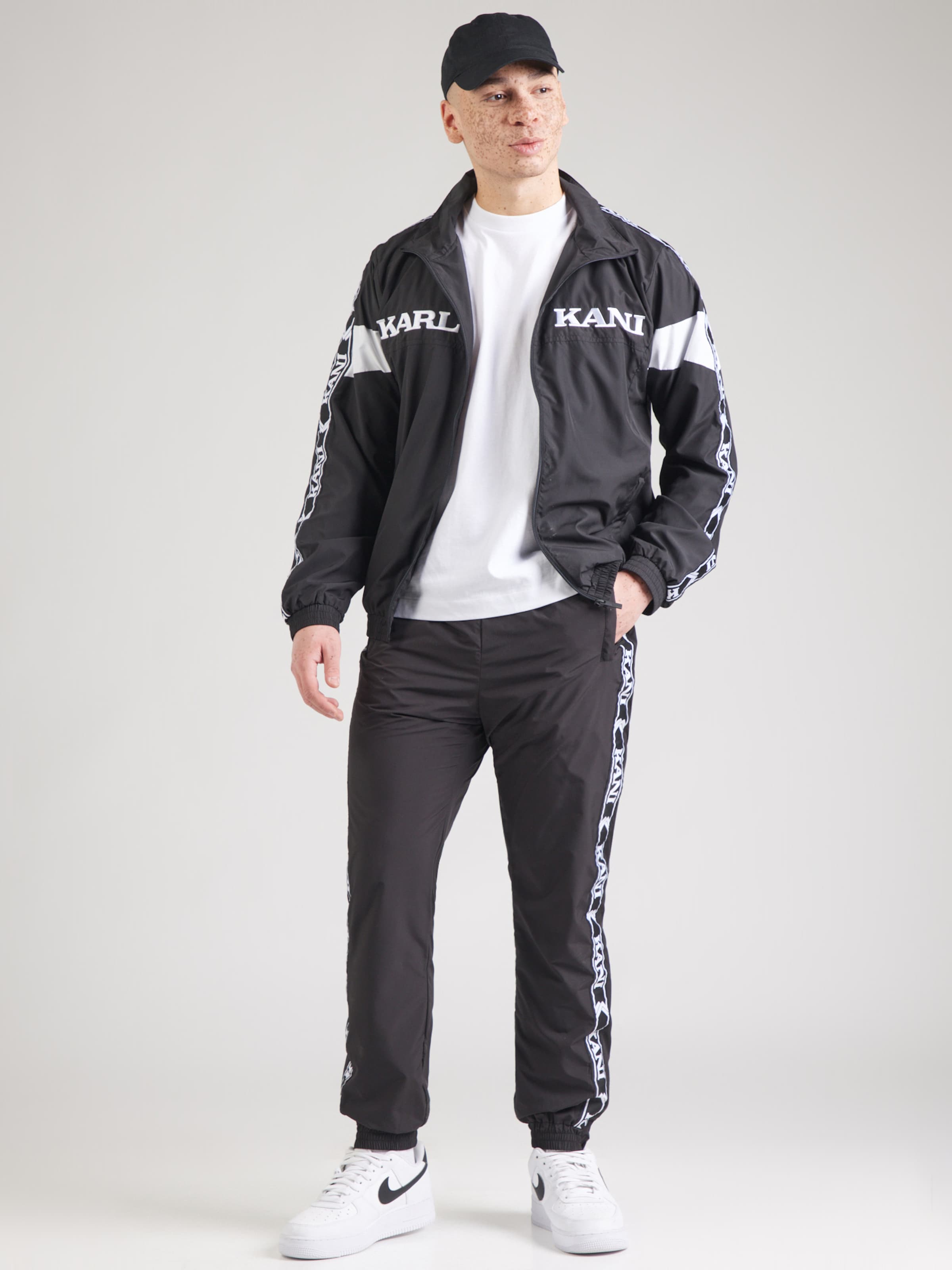Karl Kani Between-Season Jacket in Black | ABOUT YOU
