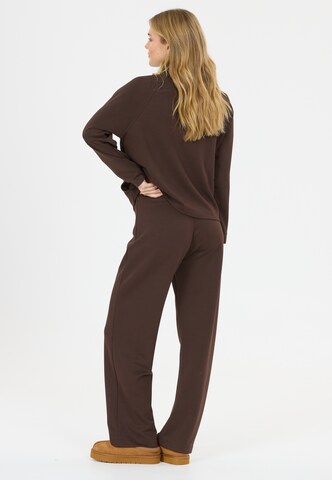 Athlecia Regular Sports trousers 'Franye' in Brown