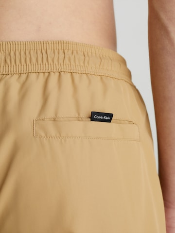 Pantaloncini da bagno di Calvin Klein Swimwear in beige