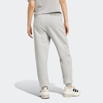 ADIDAS SPORTSWEAR - Tapered Calças de desporto 'Z.N.E.' em cinzento